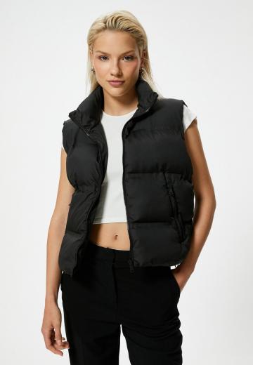 Стеганый жилет