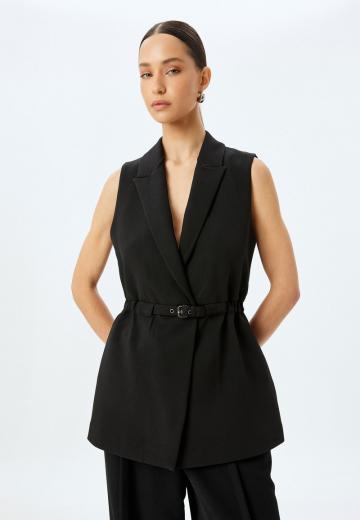 Длинный жилет