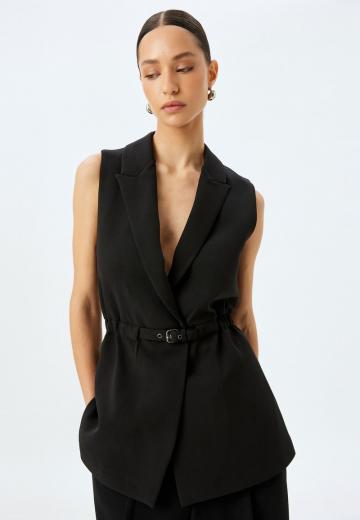 Длинный жилет