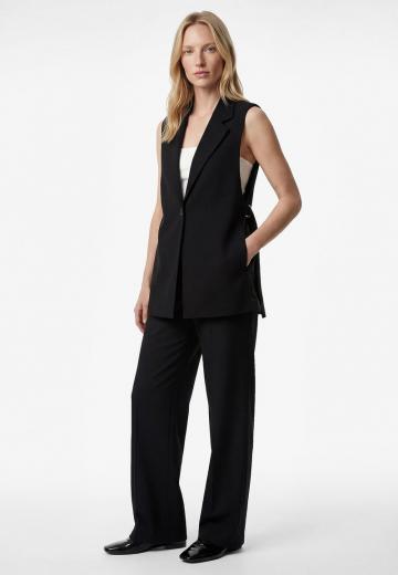 Длинный жилет