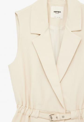 Длинный жилет