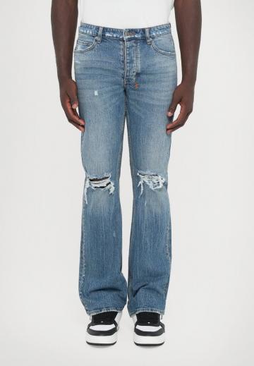 Клешеные джинсы