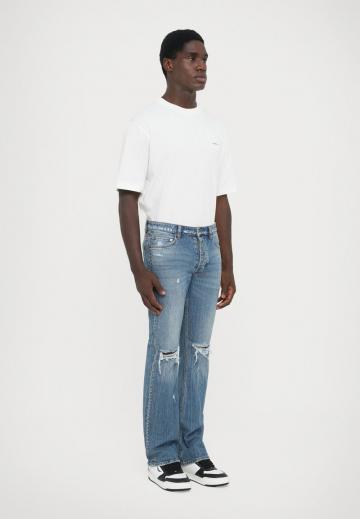 Клешеные джинсы