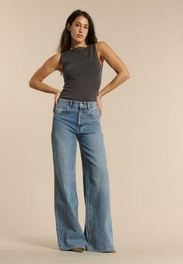 Клешеные джинсы