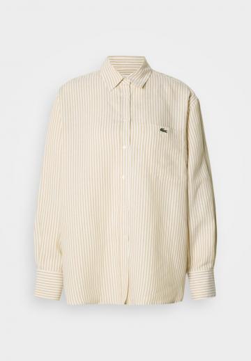 Длинная блузка