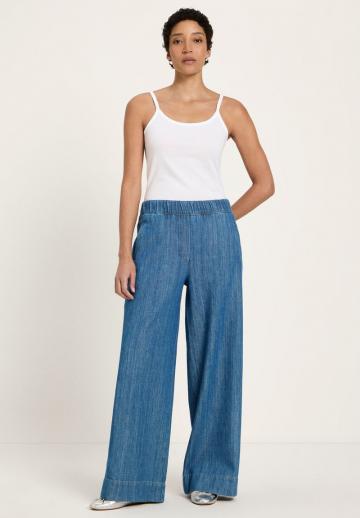 Клешеные джинсы