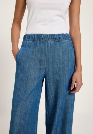 Клешеные джинсы