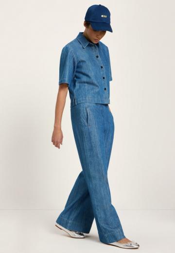 Клешеные джинсы