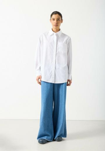 Длинная блузка