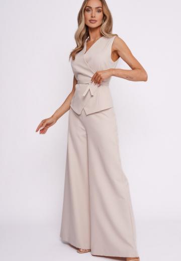 Длинный жилет