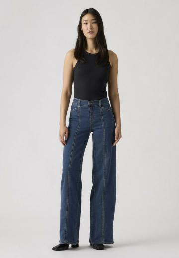 Клешеные джинсы