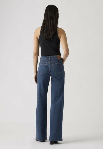 Клешеные джинсы