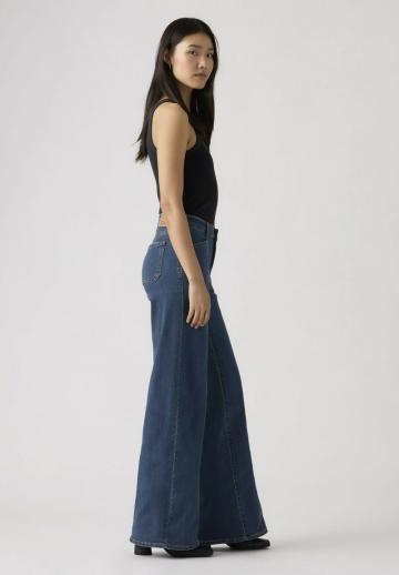 Клешеные джинсы