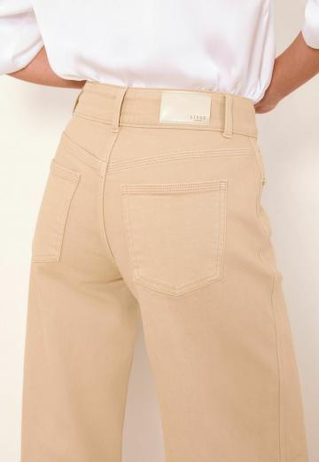 Клешеные джинсы