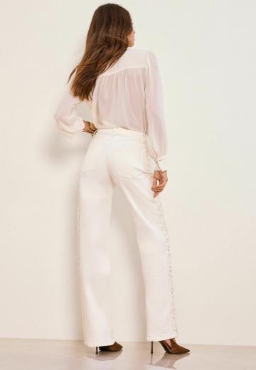 Клешеные джинсы