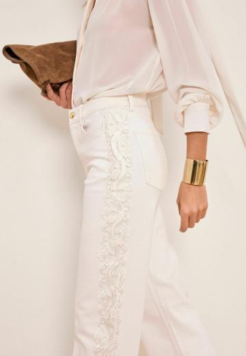 Клешеные джинсы