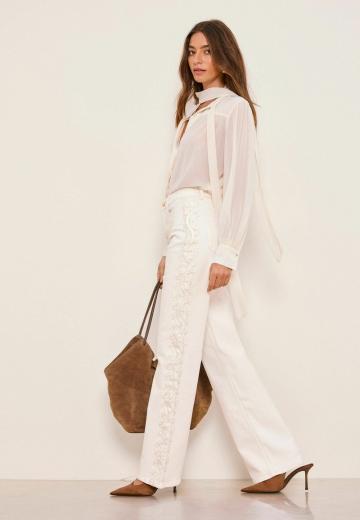 Клешеные джинсы