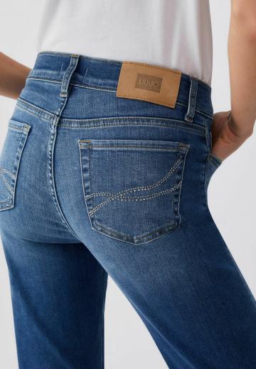 Клешеные джинсы