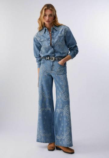 Клешеные джинсы