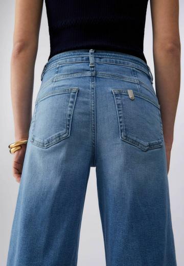 Клешеные джинсы