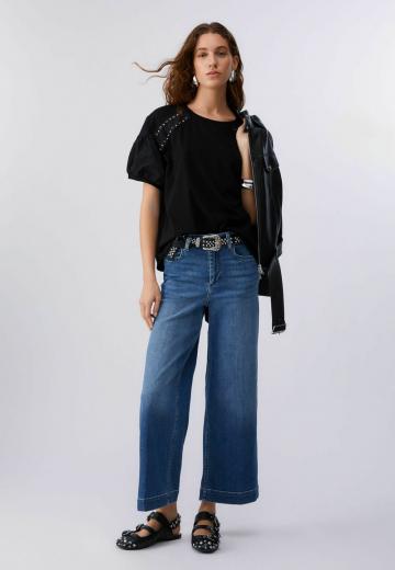 Клешеные джинсы