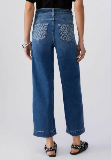 Клешеные джинсы