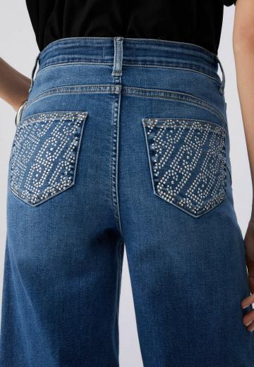 Клешеные джинсы