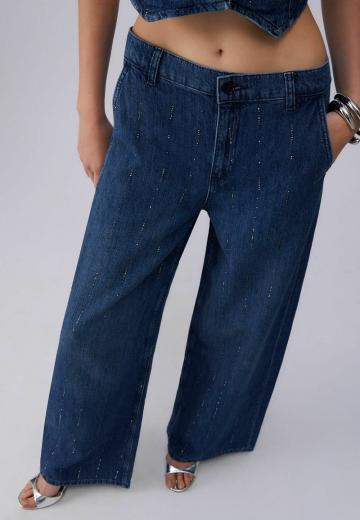 Клешеные джинсы