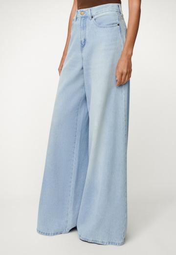 Клешеные джинсы