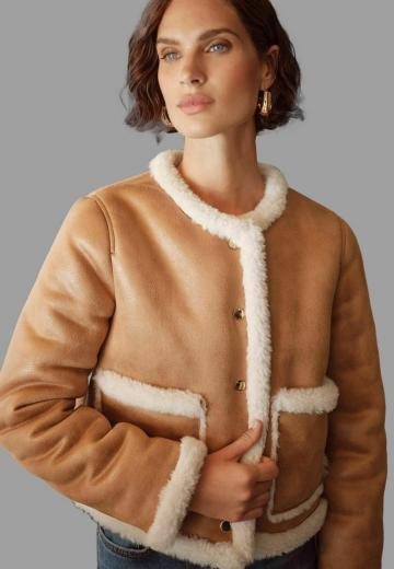 Пуховой жилет