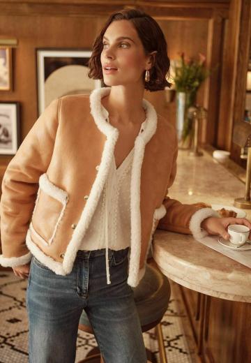 Пуховой жилет