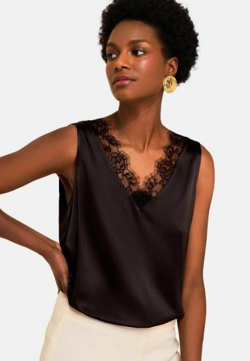 Блузка без рукавов