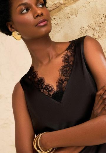 Блузка без рукавов