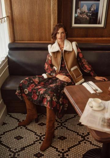 Пуховой жилет