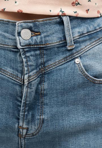 Клешеные джинсы