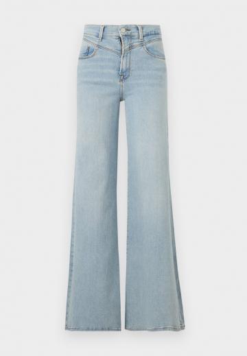 Клешеные джинсы