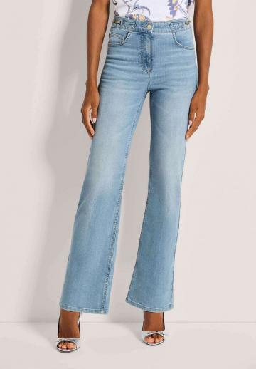 Клешеные джинсы