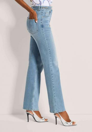 Клешеные джинсы