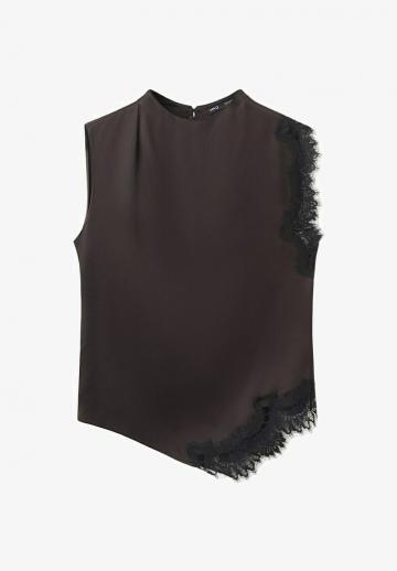 Блузка без рукавов