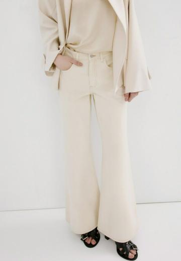 Клешеные джинсы