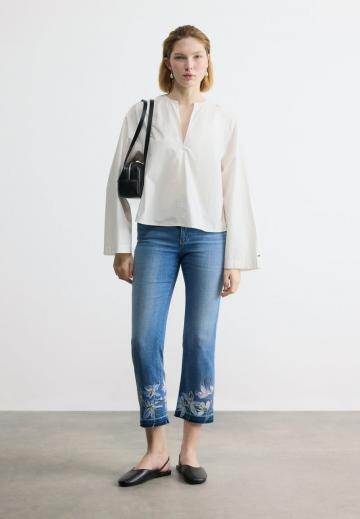 Клешеные джинсы