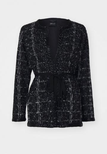 Длинный жилет