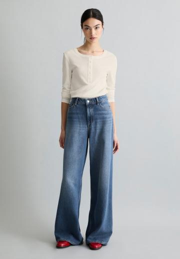 Клешеные джинсы