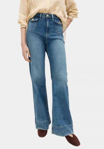 Клешеные джинсы