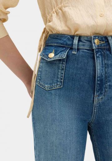 Клешеные джинсы
