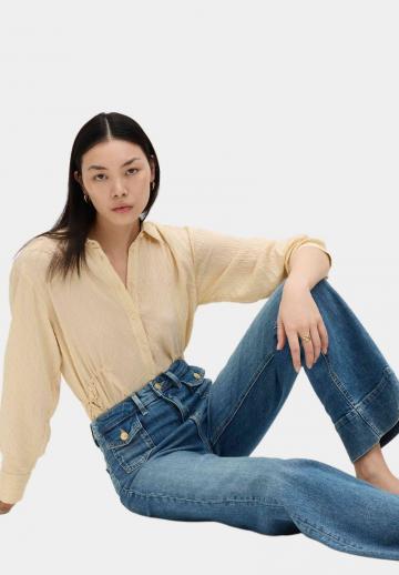 Клешеные джинсы