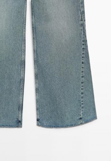 Клешеные джинсы