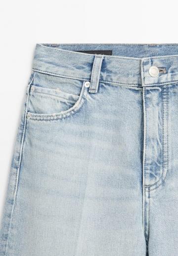 Клешеные джинсы