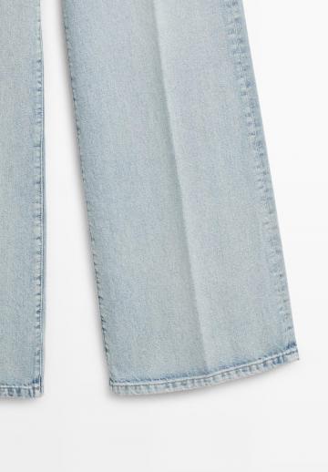 Клешеные джинсы