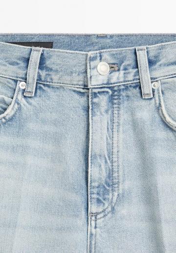 Клешеные джинсы